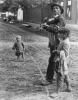 KERTESZ_WANDERING_VIOLINIST.JPG